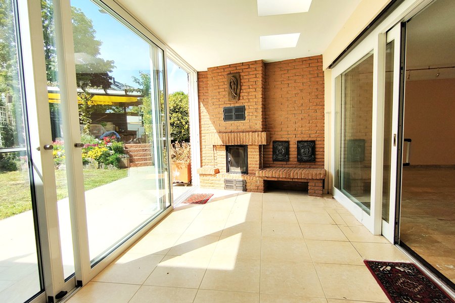 Wintergarten mit Heizkamin